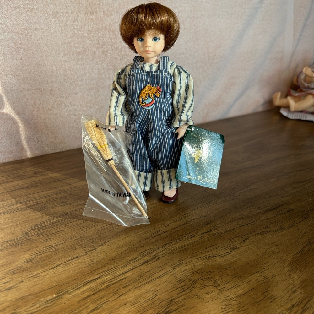 Classic Doll with Brown Hair and Striped Outfit